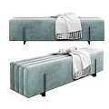 Pink Striped Ottoman with Brown Throw Blanket and Black Metal Legs