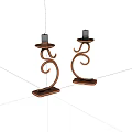 Copper Candle Holders With Curved Spiral Design And Candles On Decorative Base