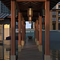 Wooden Pavilion Garden Feature With Hanging Lanterns Water Reflection And Outdoor Seating