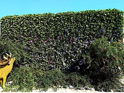 Lush Green Plant Wall With Flowers And Deer Sculpture 3d model