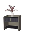 Modern Bedside Table with Striped Drawer Open Shelf and Vase of Flowers