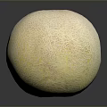 Fresh Cantaloupe With Textured Light Yellow Skin On Dark Reflective Surface