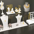 Elegant Jewelry Display Stands With Mannequins Necklaces Earrings And Golden Accessories