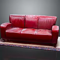 Luxurious Three Seater Red Leather Sofa On Decorative Rug In Living Room