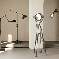 Modern Floor Lamps With Metal Stands And Unique Shade Designs In Minimalist Room