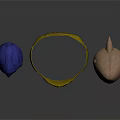 Decorative Ornaments Including Blue Helmet Gold Dragon Ring And Brown Creature Head