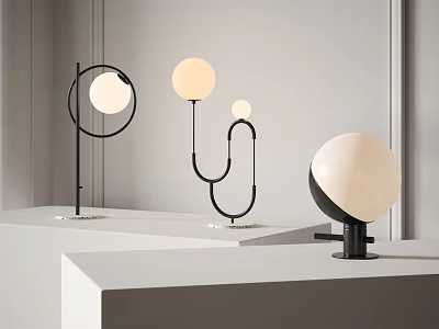 Contemporary Table Lamps With Round Globe Shades And Sculptural Metal Frames On White Stands 3d model