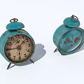 Vintage Teal Alarm Clocks With Worn Surfaces And Classic Bell Tops