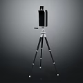 Black digital mobile phone mounted on adjustable tripod stand for photography use 3d model