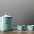 Modern Minimalist Light Blue Ceramic Tea Set with Teapot and Two Cups on Wooden Table