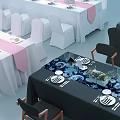 Dining Tables Decorated With White Pink Tablecloths White Black Chairs And Flower Centerpieces