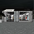 Modern Clothing Store With Glass Front Fashion Displays And Outdoor Tree