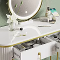 Decorative Ornament Set with White Dressing Table Gold Accents Round Mirror and Open Drawer Accessories