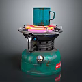 Green Portable Kitchen Gas Stove with Blue Mug on Burning Top
