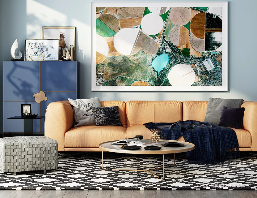 Beige Three Seater Fabric Sofa With Geometric Rug Round Coffee Table And Abstract Wall Art 3d model 