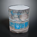 Rustic Metal Barrel With Blue Peeling Paint And Worn Look For Household Use