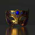 Ornate Golden Mask With Blue Gemstone Intricate Decorative Patterns And Classic Design