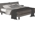 Grey Upholstered Double Bed With White Sheets Patterned Pillows Grey Throw And Side Tables
