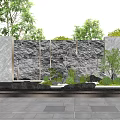 Modern Water Feature Wall With Flowing Water Green Plants And Stone Pavement