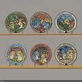 Colorful Round Plates With Cartoon Patterns On Two Wooden Shelves
