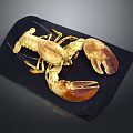 Golden Brown Lobster With Large Claws On Black Slate Surface