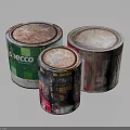 Three Colorful Paint Cans With Rusty Lids And Brand Labels