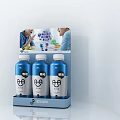 Blue Bottled Probiotic Drinks On Display Stand For Family Gathering Moments