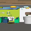 Colorful Kindergarten Interior Design With Reception Desk Green Walls Blue Sofas And Bookshelves