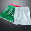 Food Packaging Bags Featuring Green White Daisy Patterns And Silver Exterior