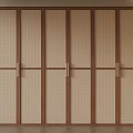 Wooden Sliding Doors With Rattan Panels And Metal Handles In Modern Home Interior