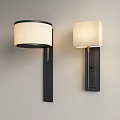 Two Modern Wall Lamps with Round and Square Fabric Shades and Black Metal Bodies