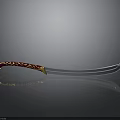 Ornate Scimitar Weapon With Red And Gold Decorative Handle And Sharp Blade