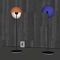 Elegant Golden And Blue Dome Shaped Pendant Lights Against Dark Wood Grain Wall