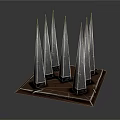 Modern Spire Like Architectural Structures Arranged On Square Base With Contemporary Design Elements 3d model