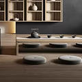 Modern Tea Room Interior Design With Wooden Shelves Stone Table And Floor Cushions