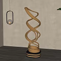 Gold Twisted Metal Sculpture With Spiral Design And Black Striped Base In Interior