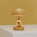 Cute Animal Shaped Table Lamp With Warm Yellow Shade And Round Wooden Base