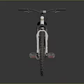 Black And White Mountain Bike With Off Road Tires And Black Seat