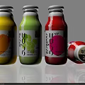 Colorful Fruit Juice Drinks in Glass Bottles with White Labels and Fruit