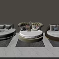 Modern Round Bed Interior With White Beige Brown Mattresses And Decorative Pillows