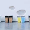 Public Facility Recycling Bins Arranged With Various Colors Wooden Panels White Wall And Gray Floor