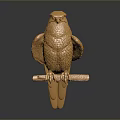 Golden Falcon Sculpture Perched On Branch With Intricate Feather Details