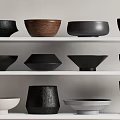 Modern Ceramic Vessels in Various Shapes and Neutral Tones Arranged on Shelves