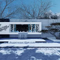Modern Feature Wall With Snowy Ground And Trees In Contemporary Garden Design