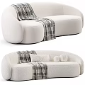 Light Colored Upholstered Two Seater Sofa With Rounded Design And Plaid Blanket 3d model
