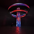 Large Colorful Art Installation With Spiral Rings Red Blue Textured Pillar And Light Effects