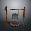 Rustic Outdoor Cooking Structure With Hanging Metal Pot And Stone Fire Pit