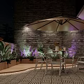 Clubhouse Outdoor Patio With Night Sky Brick Wall Umbrella Table Chairs And Purple Lighting