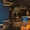 Elegant Hotel Lobby Featuring Large Blue Waterfall Painting Illuminated Reception Desk Computer And Wooden Floor