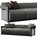 Modern Gray Three-Seater Fabric Sofa With Brown Pillows For Living Room